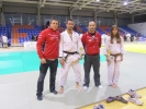 Judokas con su entrenador