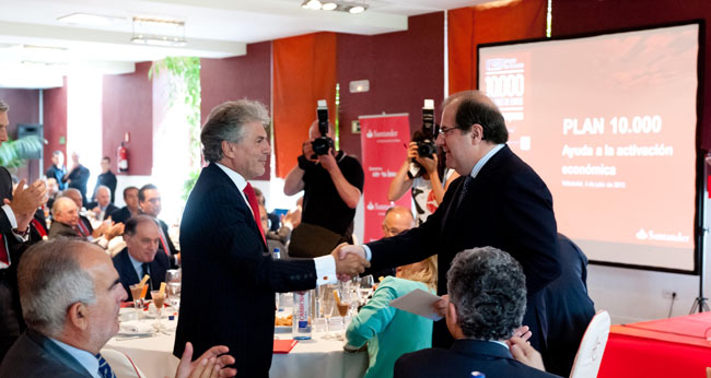 Herrera (izda.) en un acto del Santander.