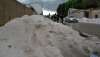 Granizo amontonado en las calles de Almazán el 2 de julio. / SN