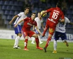 Distintos momentos del partido en el Heliodoro Rodríguez.