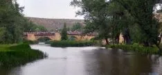 El puente de piedra con los sanjuaneros hacia el Duero./SN