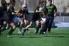 Un niño corre con el balón durante una sesión que planificó la Escuela Trebia. Soria Club de Rugby