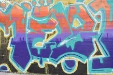 Grafiteros llenando de color la pista de Skate.