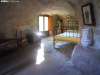 Dormitorio de la casa de piedra de Alcolea del Pinar.
