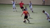 Varios jugadores del Numancia presionando a un futbolista de los canarios/ C.D. Mensajero.