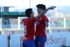 Imagen de archivo de dos jugadores del filial del Numancia celebrando un gol/ C.D. Numancia.