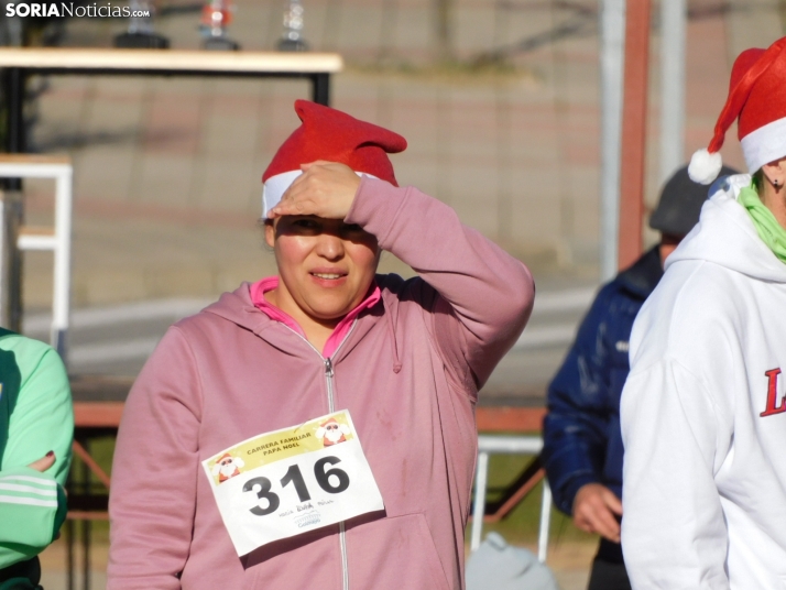 EN FOTOS | Golmayo se adelanta a las fiestas con su divertida carrera por relevos de Navidad